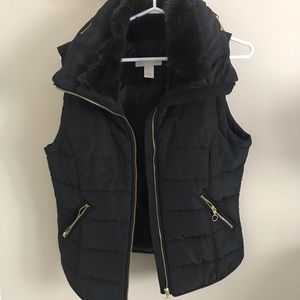 Black vest with gold trim